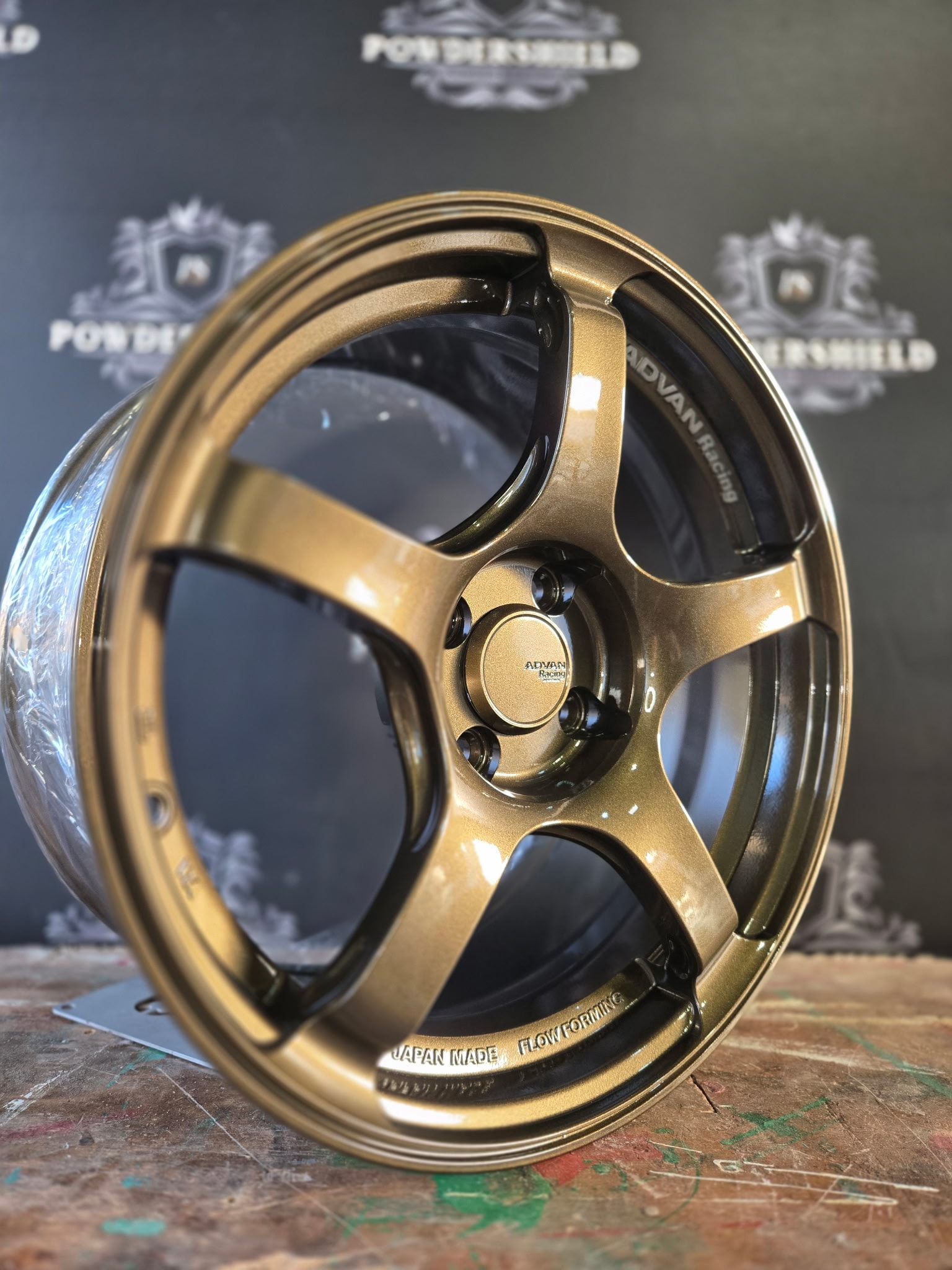 Bronze ADVAN racing wheel powder coated — wheel coating Indiana