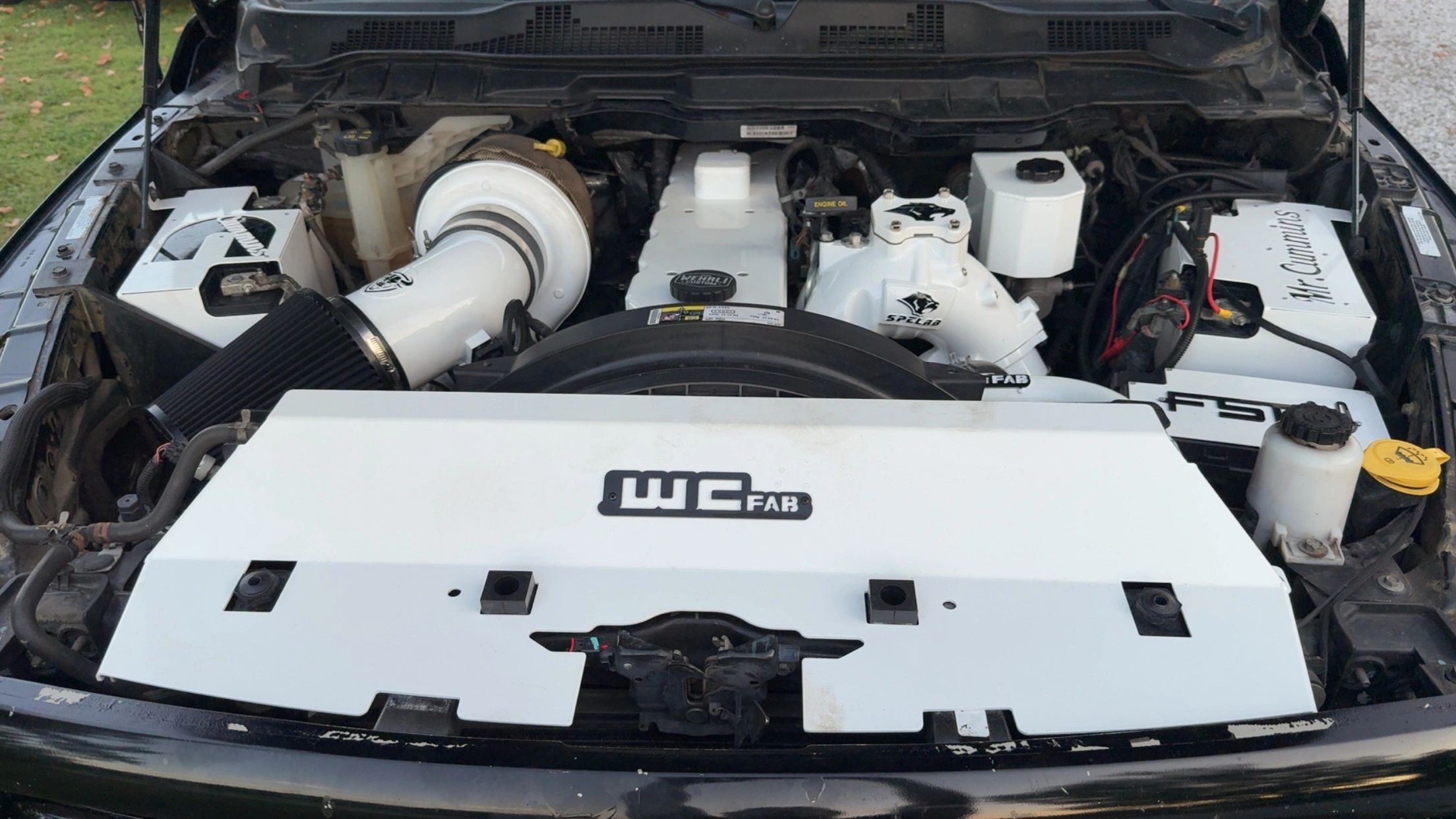 White engine bay with WC FAB branding